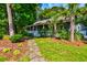 Charming home with inviting front porch, lush landscaping, and stone pathway leading to the entrance at 1872 Staffwood Rd, Johns Island, SC 29455
