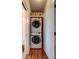 Convenient laundry closet featuring a stacked washer and dryer set at 1872 Staffwood Rd, Johns Island, SC 29455