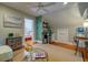 Tastefully decorated living area featuring hardwood floors, a ceiling fan, and stylish accents at 1872 Staffwood Rd, Johns Island, SC 29455