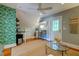 Bright living area with an AC unit and a ceiling fan, along with hardwood floors at 1872 Staffwood Rd, Johns Island, SC 29455
