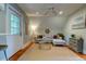 Cozy living room with hardwood floors, stylish decor, and lots of light at 1872 Staffwood Rd, Johns Island, SC 29455