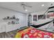Stylish bedroom with hardwood floors, a ceiling fan, decor and a basketball hoop at 2004 Hammond Dr, Mount Pleasant, SC 29466