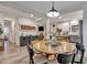 Stylish dining area open to the living and kitchen spaces, featuring a large table and modern decor at 2004 Hammond Dr, Mount Pleasant, SC 29466