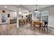 Bright, open kitchen features an island, stainless appliances, and adjacent dining area with natural light at 2004 Hammond Dr, Mount Pleasant, SC 29466