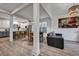 Open living space with modern flooring, a view of the kitchen, and stylish decor at 2004 Hammond Dr, Mount Pleasant, SC 29466