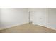 Spacious bedroom with natural light showcases ample closet space for optimal storage at 205 Bilge Rd, Ridgeville, SC 29472