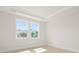 Bright bedroom offers abundant natural light through its double window design at 205 Bilge Rd, Ridgeville, SC 29472