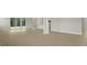 Open concept living room that flows into a kitchen with stainless steel appliances at 205 Bilge Rd, Ridgeville, SC 29472