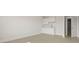 Bright utility room features a white sink and cabinets, and vinyl floors at 205 Bilge Rd, Ridgeville, SC 29472