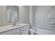Clean bathroom featuring a combination shower-tub and ample counter space at 214 Bilge Rd, Ridgeville, SC 29472