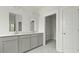 Elegant bathroom featuring double vanities and access to a spacious walk-in closet at 214 Bilge Rd, Ridgeville, SC 29472