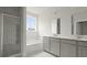 Well-lit bathroom with a large tub and glass-enclosed shower at 214 Bilge Rd, Ridgeville, SC 29472