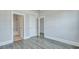A bedroom featuring gray flooring and an ensuite bath for added comfort and convenience at 214 Bilge Rd, Ridgeville, SC 29472