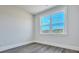 Bedroom featuring a large window with scenic view and hardwood floors at 214 Bilge Rd, Ridgeville, SC 29472