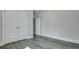 Bedroom featuring hardwood floors and a double door closet at 214 Bilge Rd, Ridgeville, SC 29472