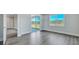 Spacious bedroom features wood floors, ample natural light, and access to the outdoors at 214 Bilge Rd, Ridgeville, SC 29472
