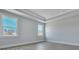 Bright bedroom with ample natural light from two windows and trey ceiling at 215 Bilge Rd, Ridgeville, SC 29472