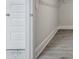 Hallway with marble tile entryway, closet door, and access to the walk-in closet at 215 Bilge Rd, Ridgeville, SC 29472