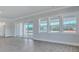 Bright living room featuring sliding glass doors, large windows, and views of the outdoors at 215 Bilge Rd, Ridgeville, SC 29472