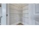Spacious pantry featuring white wire shelving perfect for storage at 215 Bilge Rd, Ridgeville, SC 29472