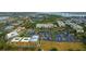 Scenic aerial view of building exteriors, parking, waterways and bridges in a coastal community at 225 Seven Farms Dr # 307, Daniel Island, SC 29492