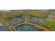 Aerial view of complex with water feature, fountain, and full parking lot at 225 Seven Farms Dr # 307, Daniel Island, SC 29492