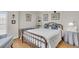 Bright bedroom featuring light walls, hardwood floors, and stylish furnishings at 225 Seven Farms Dr # 307, Daniel Island, SC 29492