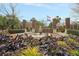 Community entrance with fountain, landscaping, and brick pillars, showcasing an inviting welcome at 225 Seven Farms Dr # 307, Daniel Island, SC 29492