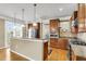 Well-equipped kitchen with stainless steel appliances, granite countertops, and hardwood floors at 225 Seven Farms Dr # 307, Daniel Island, SC 29492