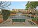 Scenic pond with a fountain, surrounded by lush greenery and residential buildings at 225 Seven Farms Dr # 307, Daniel Island, SC 29492