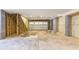 Spacious unfinished garage with concrete floors and exposed framing, ready for customization at 2356 Hut Creek Rd, Johns Island, SC 29455