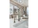 Close-up of a stylish kitchen faucet and sink with stone countertops in a well-lit, modern home at 2356 Hut Creek Rd, Johns Island, SC 29455