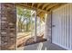 View of the outdoor patio area with stairs leading to the backyard and lush greenery at 2356 Hut Creek Rd, Johns Island, SC 29455