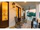 Inviting porch with rocking chairs and sunset views, perfect for relaxing evenings at 2356 Hut Creek Rd, Johns Island, SC 29455