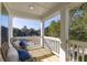 Outdoor patio area featuring comfortable wicker chairs and a picturesque view of the surrounding landscape at 2356 Hut Creek Rd, Johns Island, SC 29455