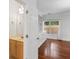 Bedroom features a half bath and a view to the wooden fence at 241 Howle Ave # G, Charleston, SC 29412