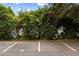 Designated parking spaces featuring painted lines and space numbers at 241 Howle Ave # G, Charleston, SC 29412