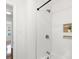 Bathroom featuring modern white subway tile, alcove shelving, shower and stylish design at 2704 Orchid Ave, North Charleston, SC 29405