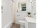Bathroom showcasing a tub with shower, light pink curtain, vanity and a vintage patterned rug at 2704 Orchid Ave, North Charleston, SC 29405
