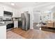 Open kitchen featuring stainless steel appliances, stylish finishes, and convenient access to the living area at 2704 Orchid Ave, North Charleston, SC 29405