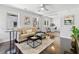 Bright living room with polished hardwood floors, neutral decor, and an open layout for easy living at 2704 Orchid Ave, North Charleston, SC 29405