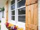Close up of the custom shutters and flower box highlighting the home's attention to detail and charm at 2704 Orchid Ave, North Charleston, SC 29405
