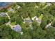 Aerial view of a single Gathering home nestled in a lush wooded lot near the marsh and waterway at 3171 Pignatelli Cres, Mount Pleasant, SC 29466