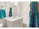 Bathroom featuring a white sink vanity, shower/tub combination with colorful patterned curtain, and a large mirror at 3171 Pignatelli Cres, Mount Pleasant, SC 29466