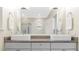 Bathroom featuring double sinks with granite countertops and white cabinetry, offering a clean and modern design at 3171 Pignatelli Cres, Mount Pleasant, SC 29466