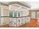 Foyer with hardwood floors, coffered ceilings, and large windows, creating a bright and welcoming entrance at 3171 Pignatelli Cres, Mount Pleasant, SC 29466