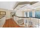 Upstairs hallway with coffered ceilings and hardwood flooring at 3171 Pignatelli Cres, Mount Pleasant, SC 29466