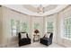 Cozy sitting area with large windows offering plenty of natural light and views of the lush greenery outside at 3171 Pignatelli Cres, Mount Pleasant, SC 29466