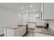 Kitchen with stainless steel appliances and granite countertops and hardwood floors at 330 Tiliwa St, Summerville, SC 29486