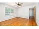 Cozy bedroom with hardwood floors, a ceiling fan, and plenty of natural light at 344 Canterbury Rd, Charleston, SC 29407